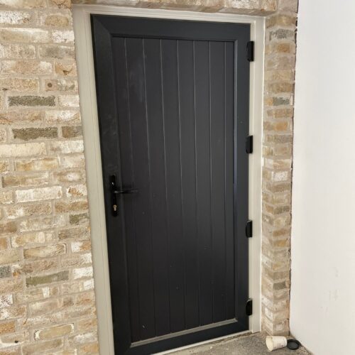 A uPVC flood door designed and installed by Lakeside Flood Solutions