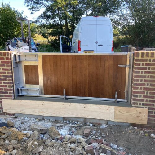 A flood gate barrier for homes installed on a residential property by Lakeside Flood Solutions