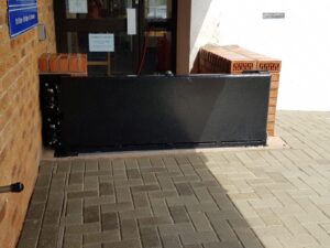 patio door being protected by doorway flood barrier