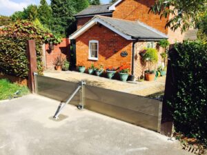 Flood defences for homes: A gate installed on a house patio by Lakeside Flood Solutions